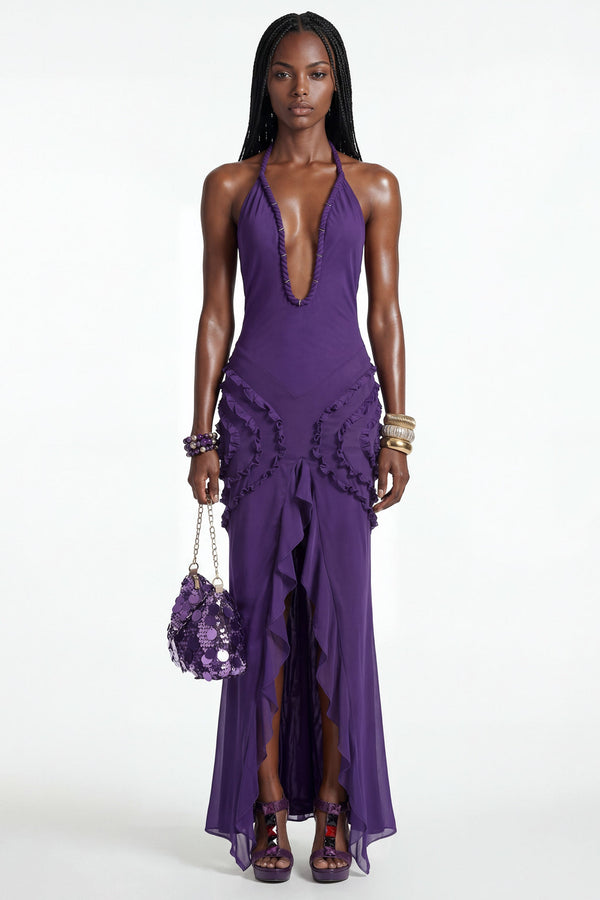 Model wearing the Narcissa Dress, a purple plunge neck mesh maxi dress with rope detailing